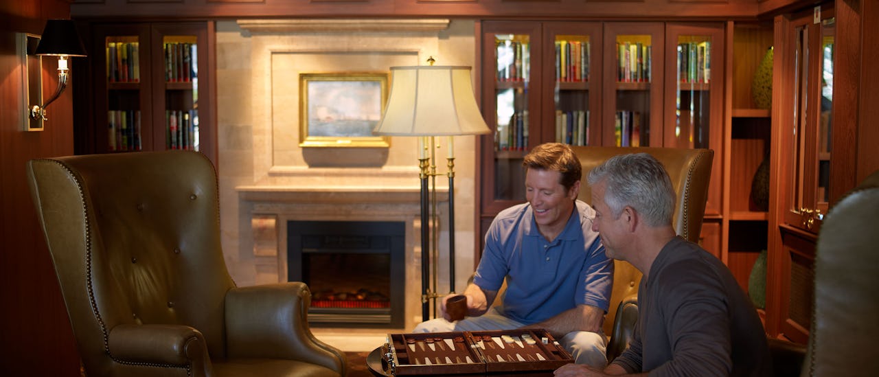 Enrich your mind in the tranquility o the English-style Library with over 2,000 books