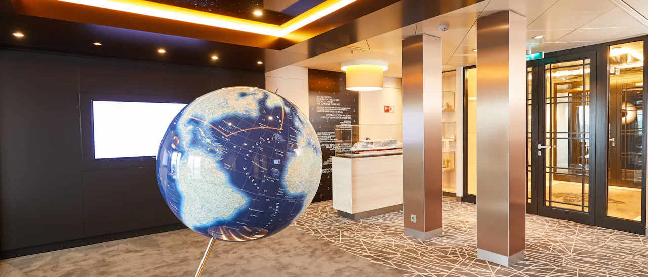The EUROPA 2 museum is located in the waiting area of the Cruise Sales Lounge