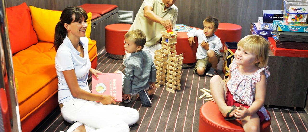 Families are welcome and offered a room full of activities for kids.